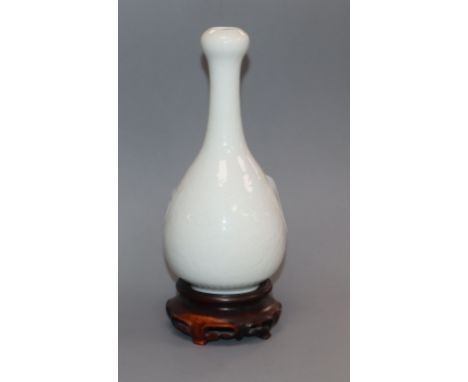 A Chinese garlic neck incised porcelain vase, Republic period Provenance - The owner and her family lived in Singapore in the