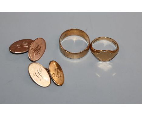 A pair of 9ct gold cufflinks, a 9ct gold wedding band and a 9ct gold signet ring.