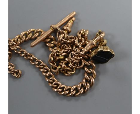 A 9ct. gold curb link watch chain, in two parts, with a yellow metal and agate fob seal, gross 44 grams.
