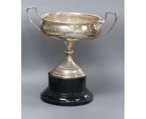 A George V silver two handled trophy cup, London, 1926, 15.2cm, 11 oz.