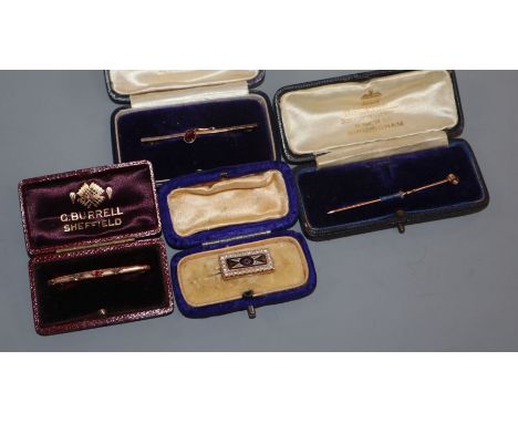 A Victorian, yellow metal, seed pearl and enamel small brooch, two gem set bar brooches including 9ct and one other pin.
