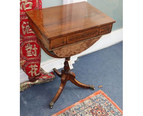 A Regency inlaid rosewood work table on tripod base W.51cm