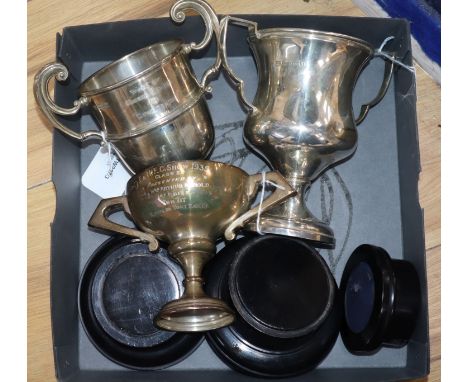 Three George V and later assorted silver trophy cups.