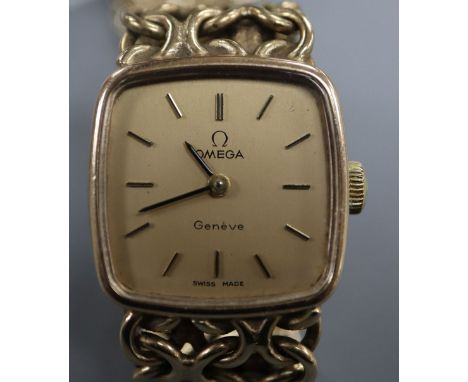 A lady's 1970's 9ct gold Omega manual wind wrist watch, on a 9ct gold Omega bracelet, with Omega box and certificate.