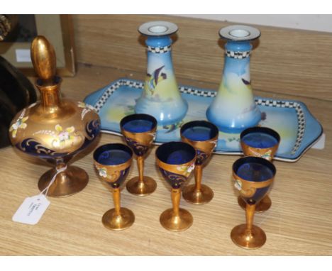 A Venetian-style gilded and enamelled blue glass seven piece liqueur set and a ceramic part dressing table set comprising a p