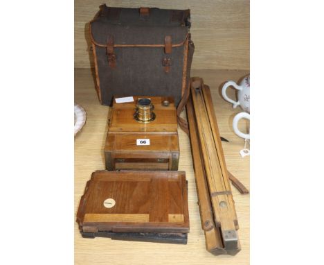 A 19th century Eugen Loeber plate camera and tripod stand