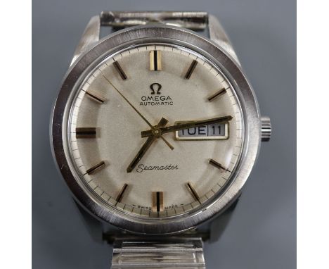 A gentleman's late 1960's stainless steel Omega Seamaster day/date automatic wrist watch, on associated bracelet, with guaran