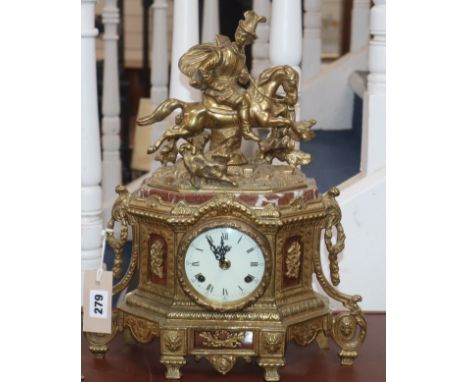 A French gilt metal and marble mantel clock