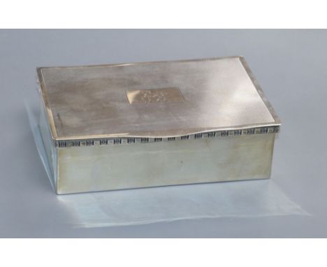 A modern silver cigarette box, by Cooper Brothers &amp; Sons, Sheffield, 1973, 15cm.