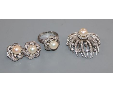 A modern suite of white metal, cultured pearl and diamond jewellery, comprising a ring, brooch and pair of ear clips.