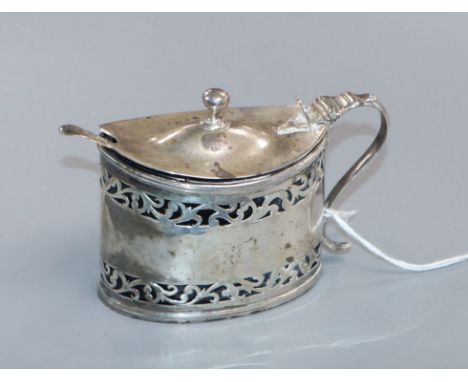 A George III pierced silver oval mustard by Henry Chawner, London, 1791, 10cm.