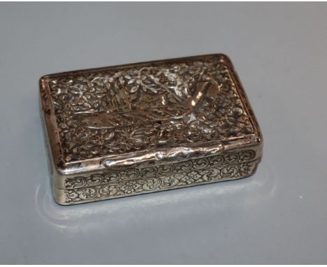 An early 20th century? Persian white metal snuff box, embossed with boat, elephants and scrolling foliage, 79mm.