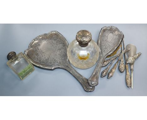 A quantity of silver-handled dressing table items, dressing table pieces.