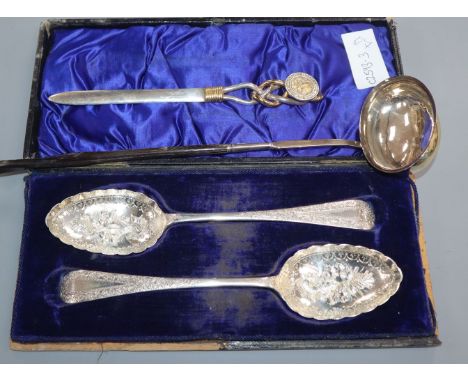 A cased pair of Victorian silver berry spoons, a Georgian toddy ladle and a 925 letter opener.