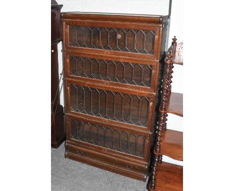 A Globe Wernicke Four Tier Oak Bookcase, 87cm by 30cm by 147cm