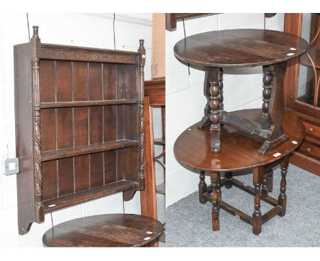 A Three Tier Oak Hanging Shelf, 86cm by 97cm; together with two oak drop leaf tables