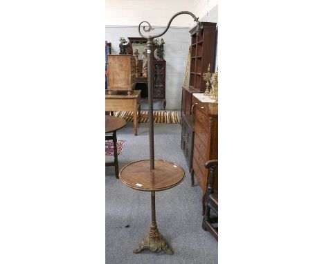 An Adjustable Brass Standard Lamp, with mahogany shelf