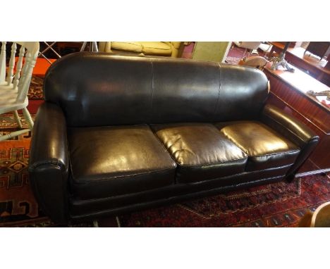 A contemporary black leather three seater sofa raised on mahogany seat, H:84cm W:206cm D:80cm