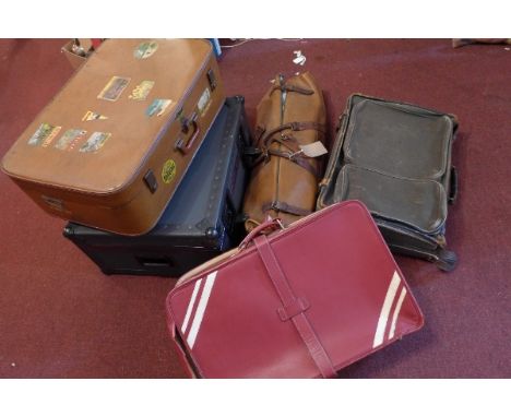 Four vintage suitcases and one other case 