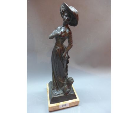 A cast bronze model of female wearing dress with dog by her side, set on square marble base, H:37cm