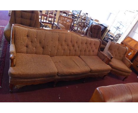 A French walnut three seater sofa upholstered button back, L:215cm