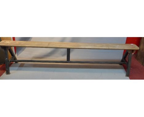 A refectory reclaimed wood bench on metal support. L:213cm