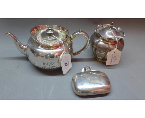 A silver plated tea pot, tea caddy and hipflask