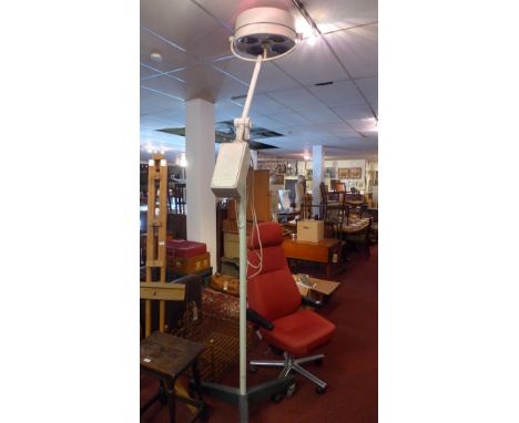 A large overhead dentist light. 