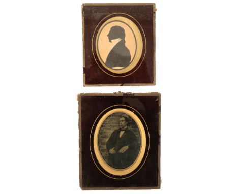 A VICTORIAN PORTRAIT PHOTOGRAPH ON GLASS inscribed to the reverse "William Oldfield Phippard, Esq. of Wareham Priory 1845", a