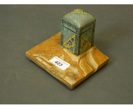 A champleve enamel inkwell mounted on a marble pen tray, 5'' x 4½'', 4½'' high
