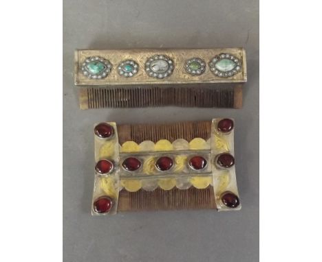 A Turkmeni silver and gilt wash comb set with garnet coloured stones, and another set with turquoise, 4½'' long