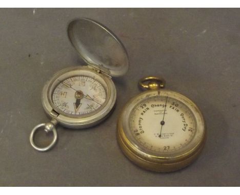 A late C19th brass cased barometer, and a WWI compass dated 1918, 2'' diameter