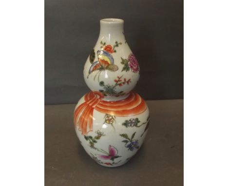 A Chinese double gourd porcelain vase with painted enamel butterfly decoration, 6 character mark, 8'' high