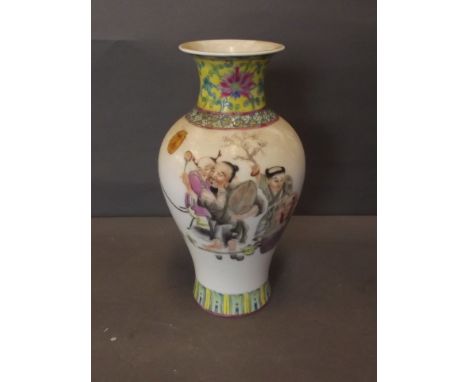 An early C20th Chinese porcelain vase with enamel decoration of a teacher with his students, character inscription verso, 4 c