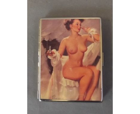 A silver plated cigarette case with later applied cold enamel plaque of a female nude, 4'' long