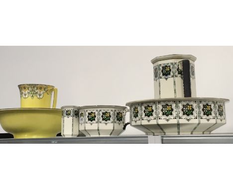 The residue of an early 20th century Cauldon china bedroom washing set together with a similar jug and basin decorated with y