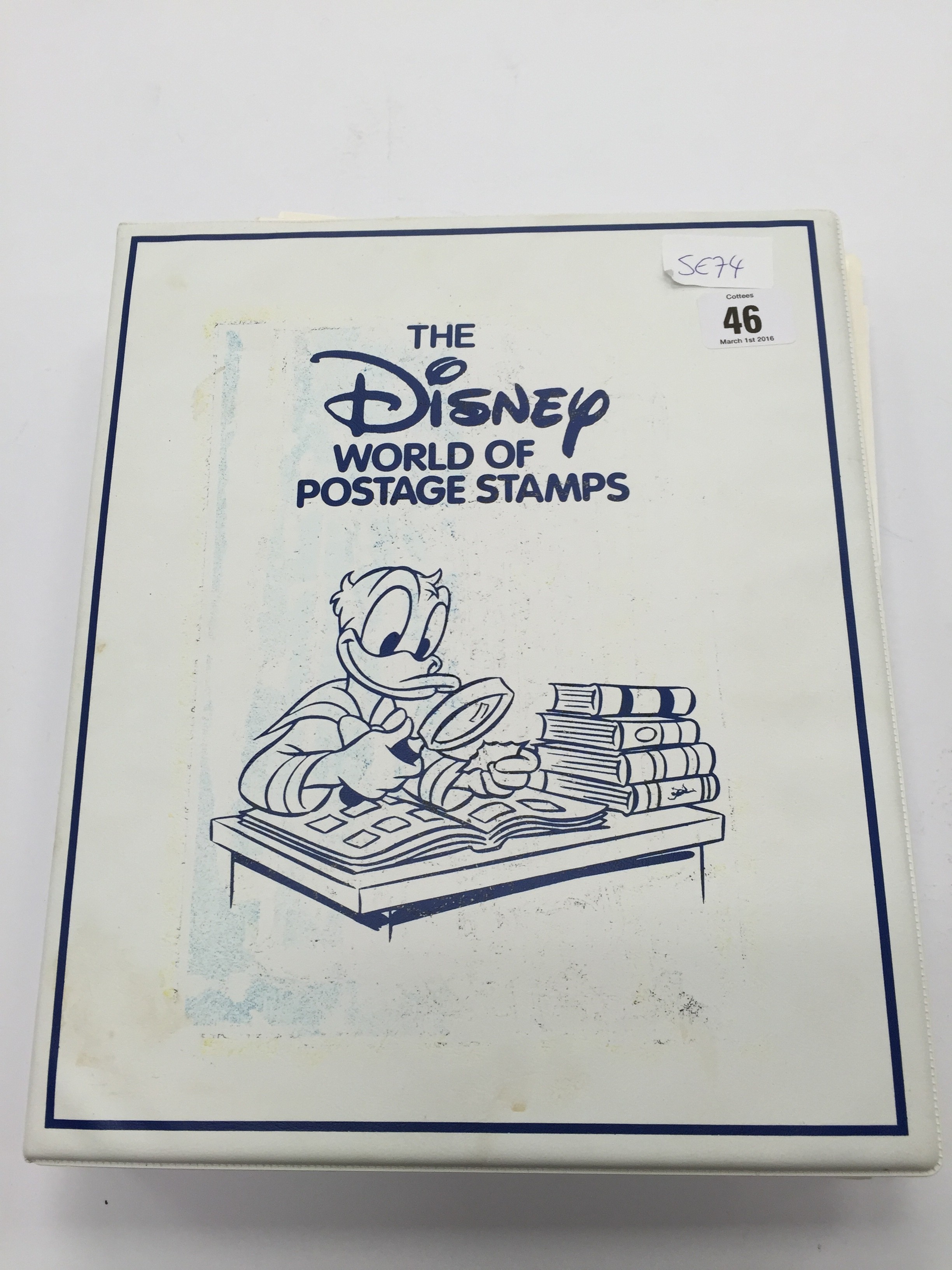 The Disney World of postage stamps An album and contents.