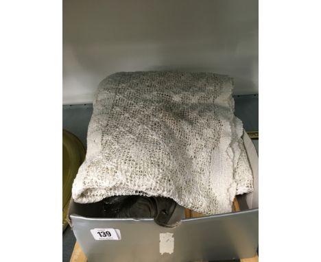 A box of collectables including a lace cloth, geometry set and other items.
(R29)