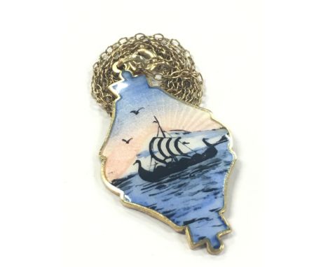 An Ivor T. Holth silver and enamel galleon pendant.
