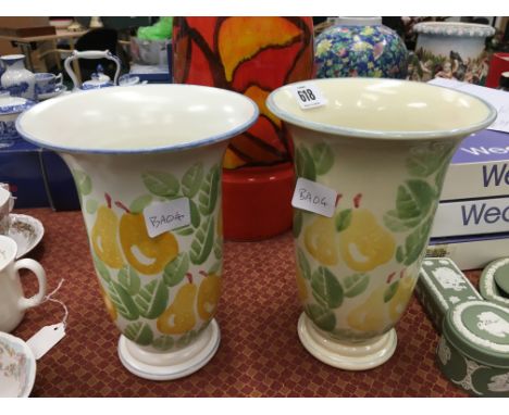 A pair of Poole Pottery vases decorated in the Dorset Fruits pattern, hand thrown by Alan Clarke in the Pears design (9 inche