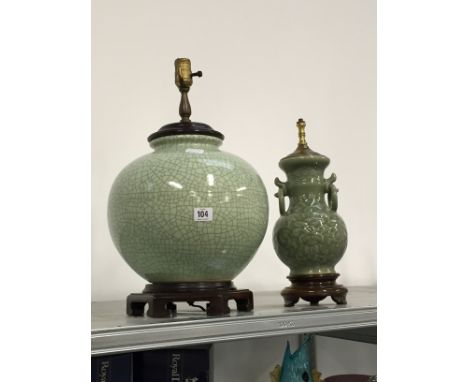 A large bulbous shape green crackle glaze Chinese porcelain lamp base with wooden base and mounts together with a smaller gre