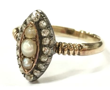 A Victorian gold diamond and natural pearl ring.