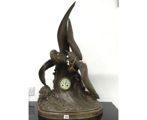 A massive French Bronzed mantle clock modelled as a pair of Gulls riding a wave with small central enamel clock by H Lechesne