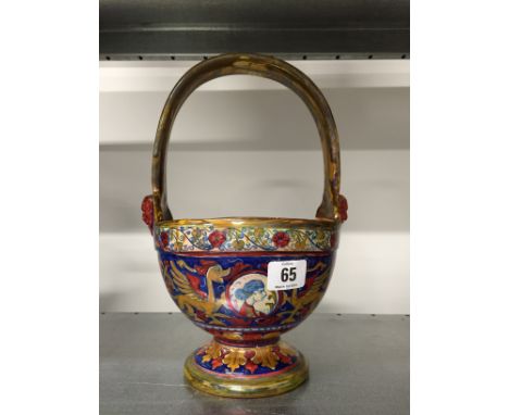 An Italian faience Maiolica basket decorated with Griffins and portrait medallions to front and reverse. 