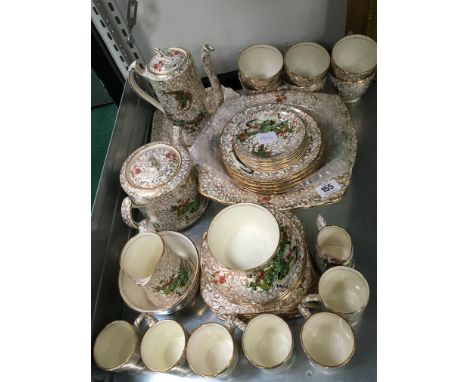 The residue of an early 20th century china tea and coffee service, decorated in the Hainan pattern.