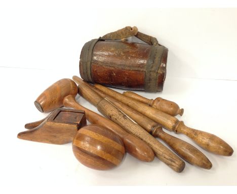 A 19th century wooden Cider costrel together with other treen items including sail maker's fids, gavels, nut cracker and tree