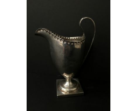 A helmet shape silver cream jug: Chester.