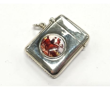 A silver and enamel effect Vesta case decorated with Huntsmen.