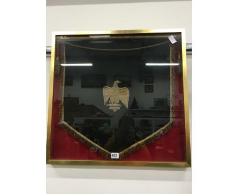 A framed and glazed First Royal Dragoons Concert band music stand fabric banner (solo clarinet).