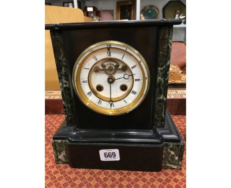 A late 19th century slate and marble mantle clock.